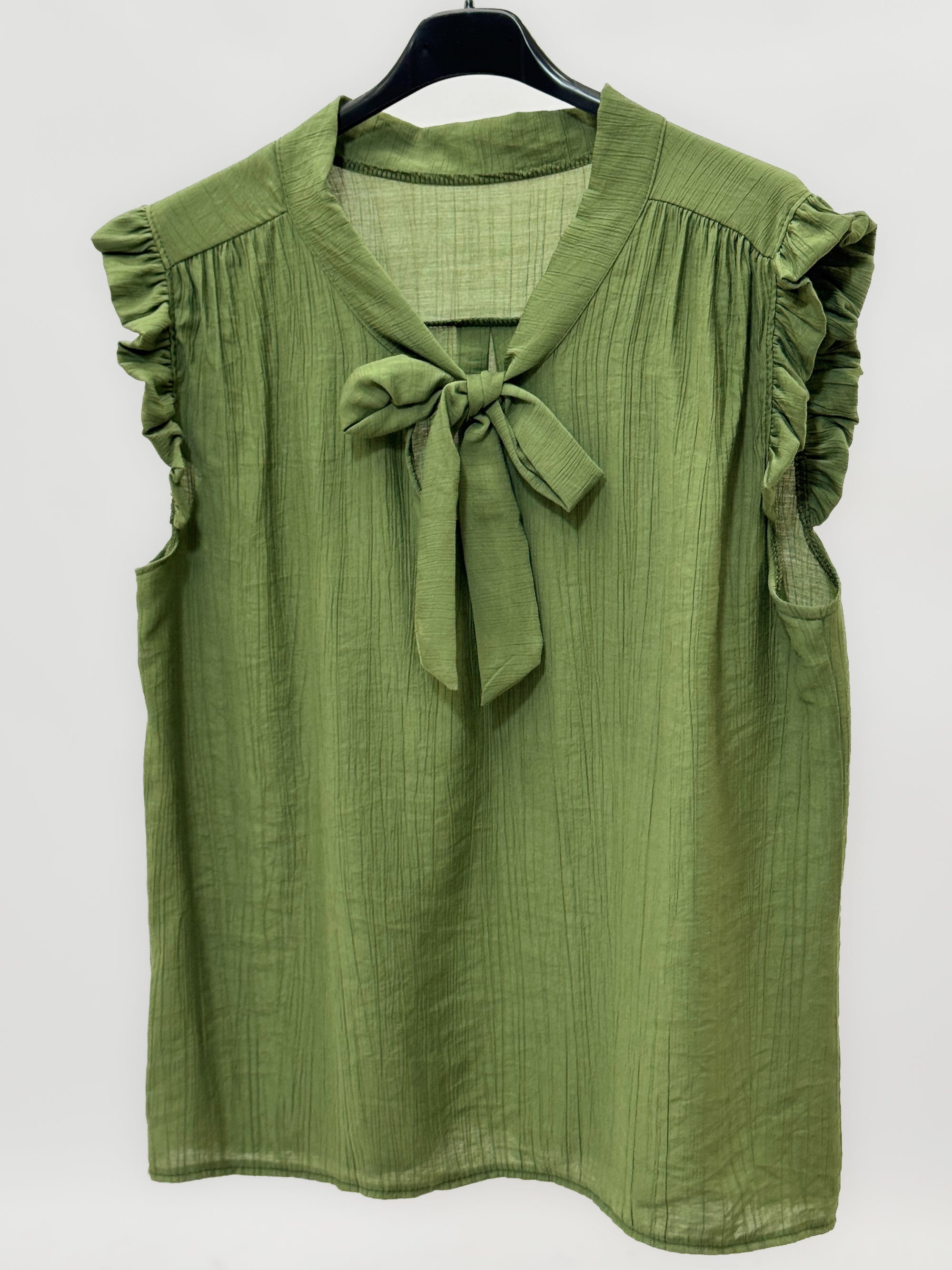 Blusa con fiocco e volant elegante e super femminile