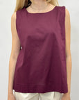 Top fluido senza maniche elegante e minimal