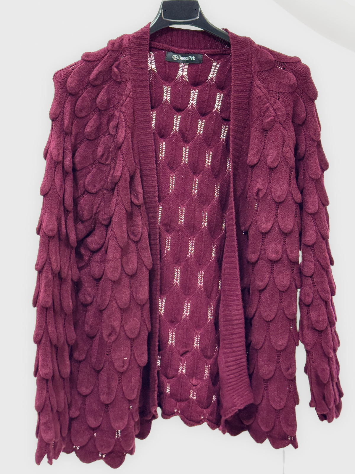 Cardigan morbido con applicazioni in rilievo