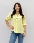 Camicia con bottone