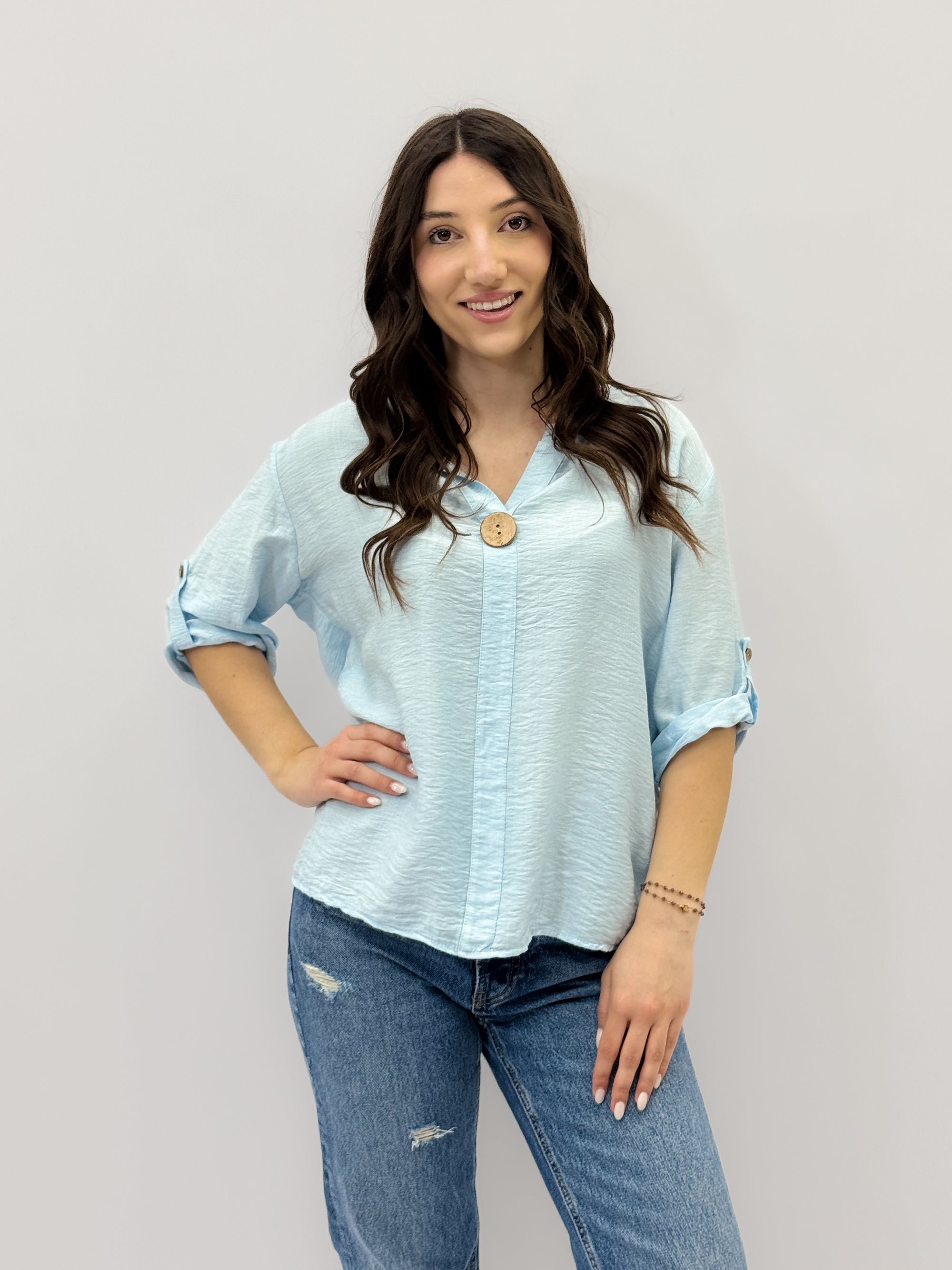 Camicia con bottone