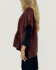 Cardigan aperto con nodo frontale