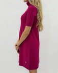 Abito in maglia a trecce con collo alto