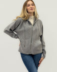 Cardigan con cappuccio e zip
