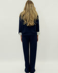 Completo in tessuto tecnico con felpa oversize e pantalone palazzo