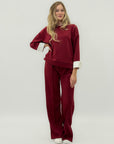 Completo in tessuto tecnico con felpa oversize e pantalone palazzo