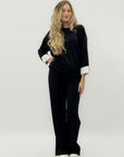 Completo in tessuto tecnico con felpa oversize e pantalone palazzo