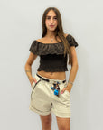 Pantaloncini con cintura e foulard