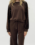 Completo con inserti di paillettes
