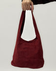 Borsa secchiello in vera pelle scamosciata con borchie – Made in Italy