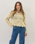 Maglia crochet con bottoni
