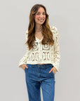 Maglia crochet con bottoni