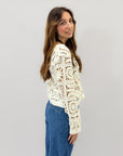 Maglia crochet con bottoni