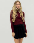 Gonna corta in suede plissettata – Stile chic e femminile