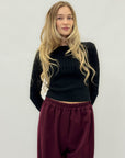 Maglione trecce a girocollo – Classico e femminile