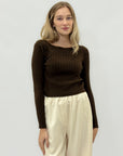 Maglione trecce a girocollo – Classico e femminile
