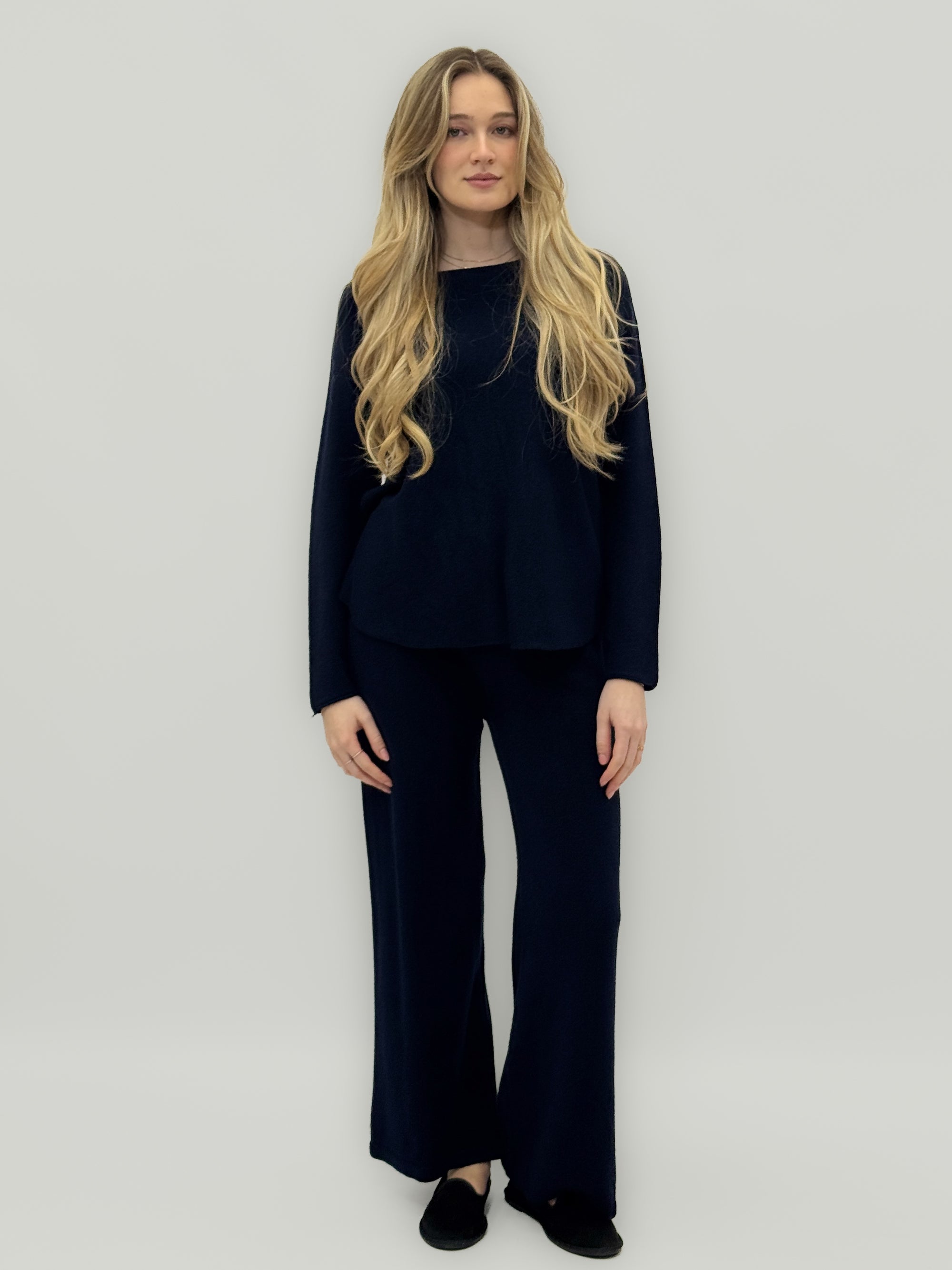 Completo morbido in maglia tinta unita