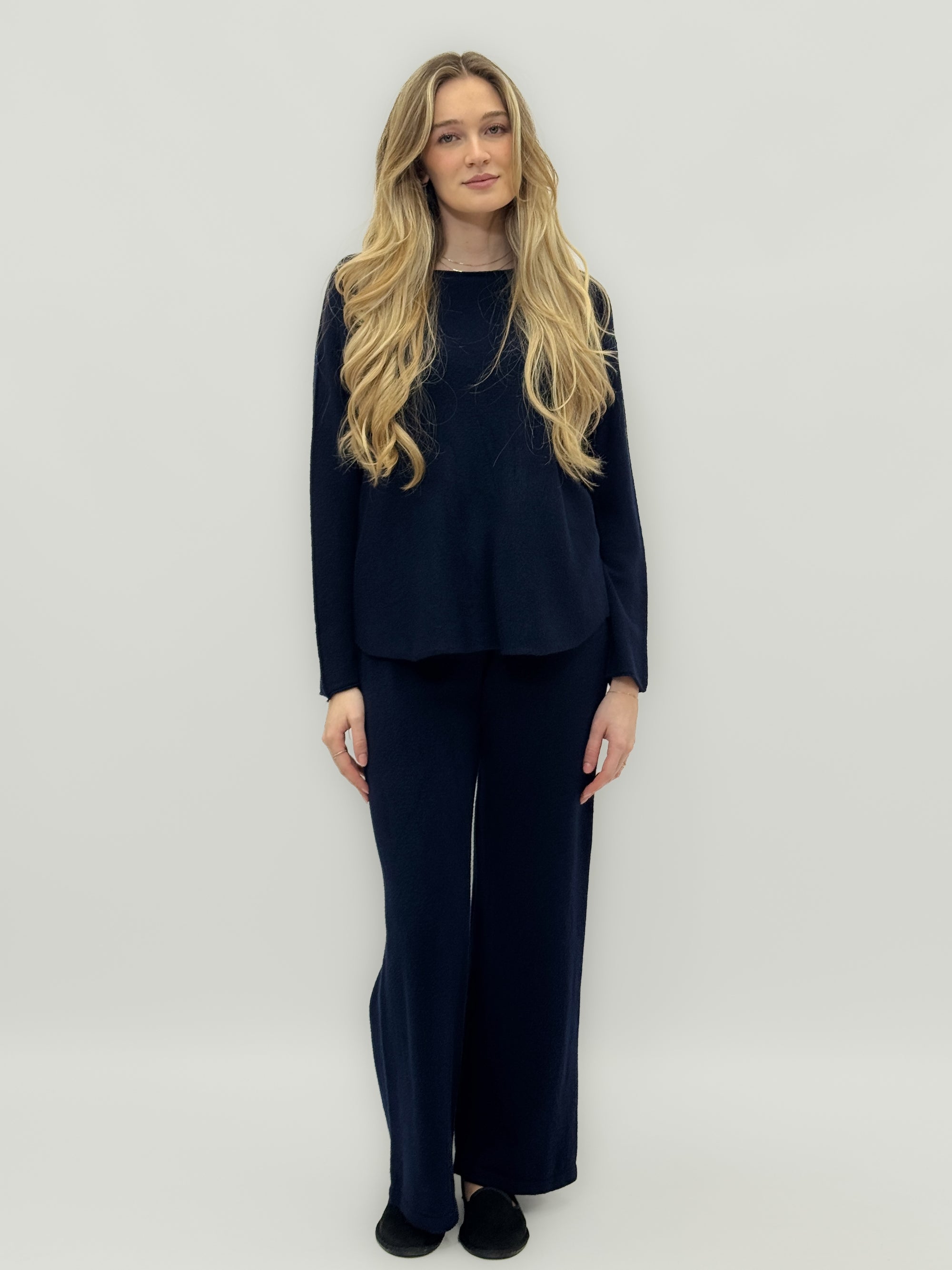 Completo morbido in maglia tinta unita