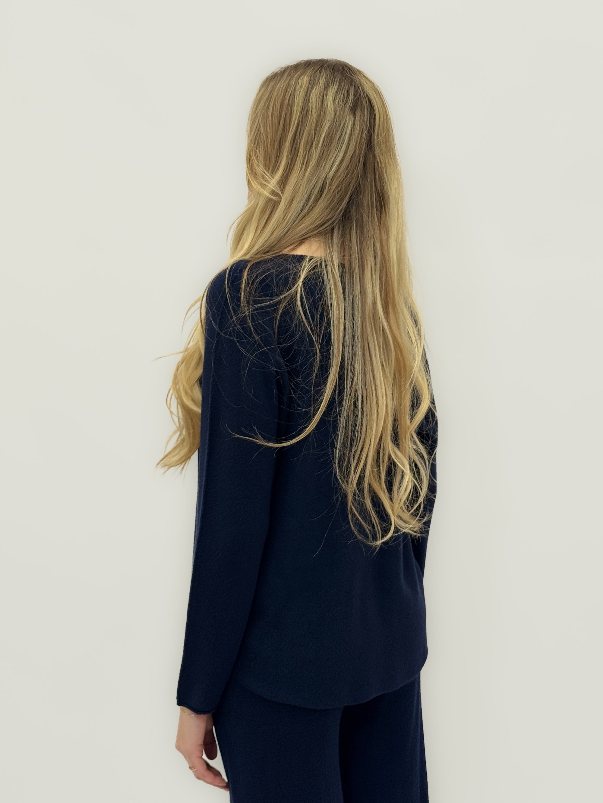 Completo morbido in maglia tinta unita