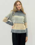 Maglione geometrico a blocchi di colore – Morbido e moderno