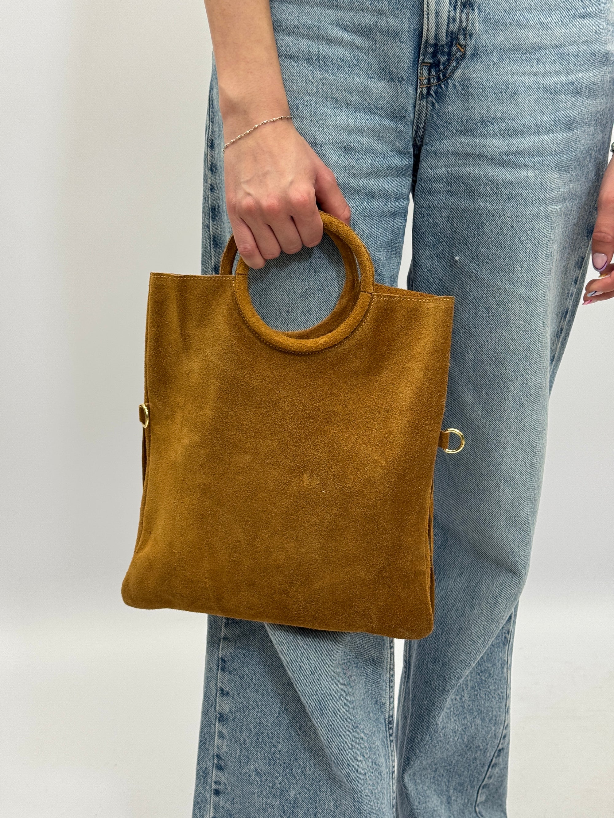 Borsa con manico rigido e frange in vera pelle