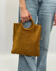 Borsa con manico rigido e frange in vera pelle