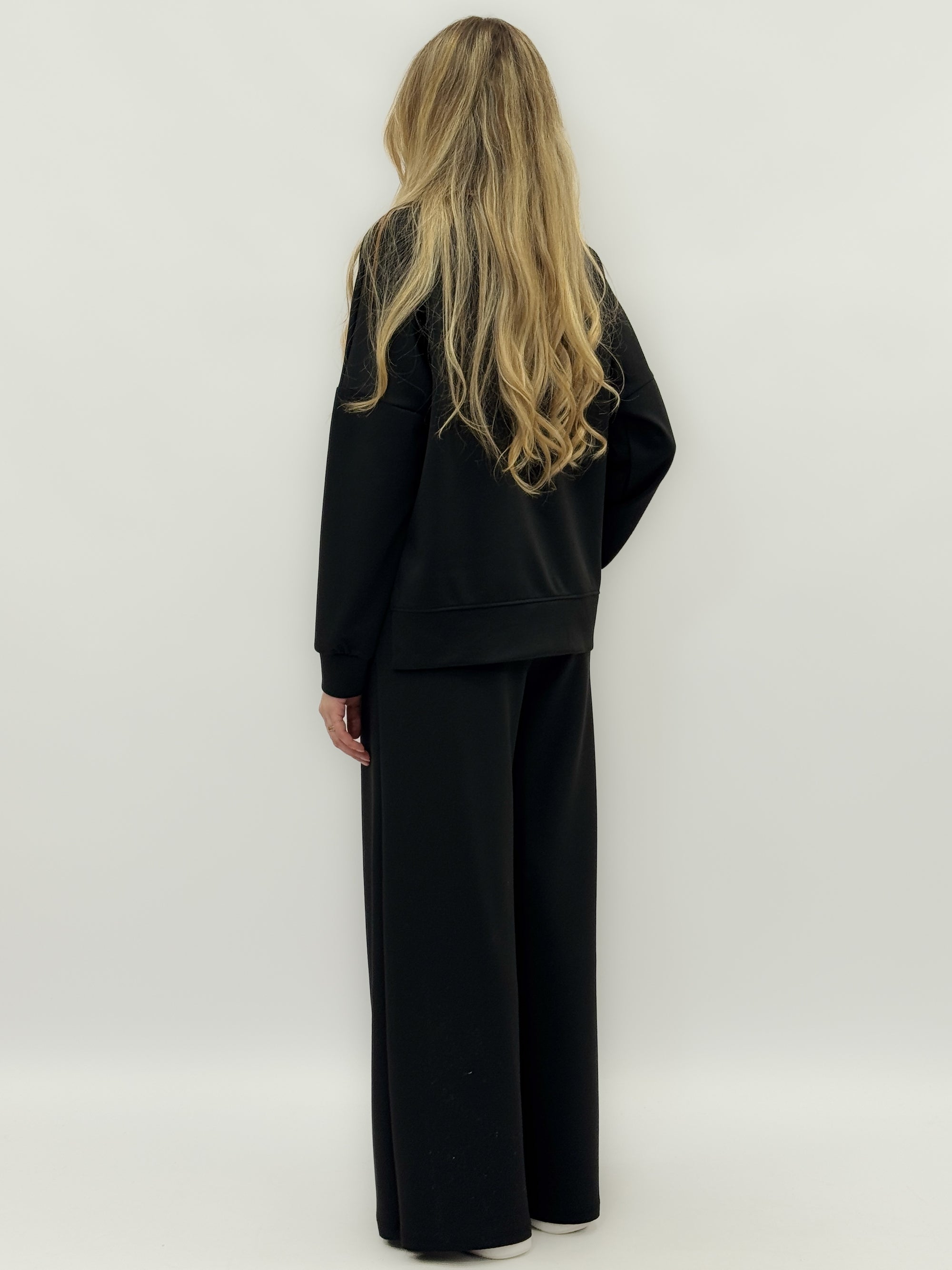 Completo felpa con pantaloni lunghi a palazzo