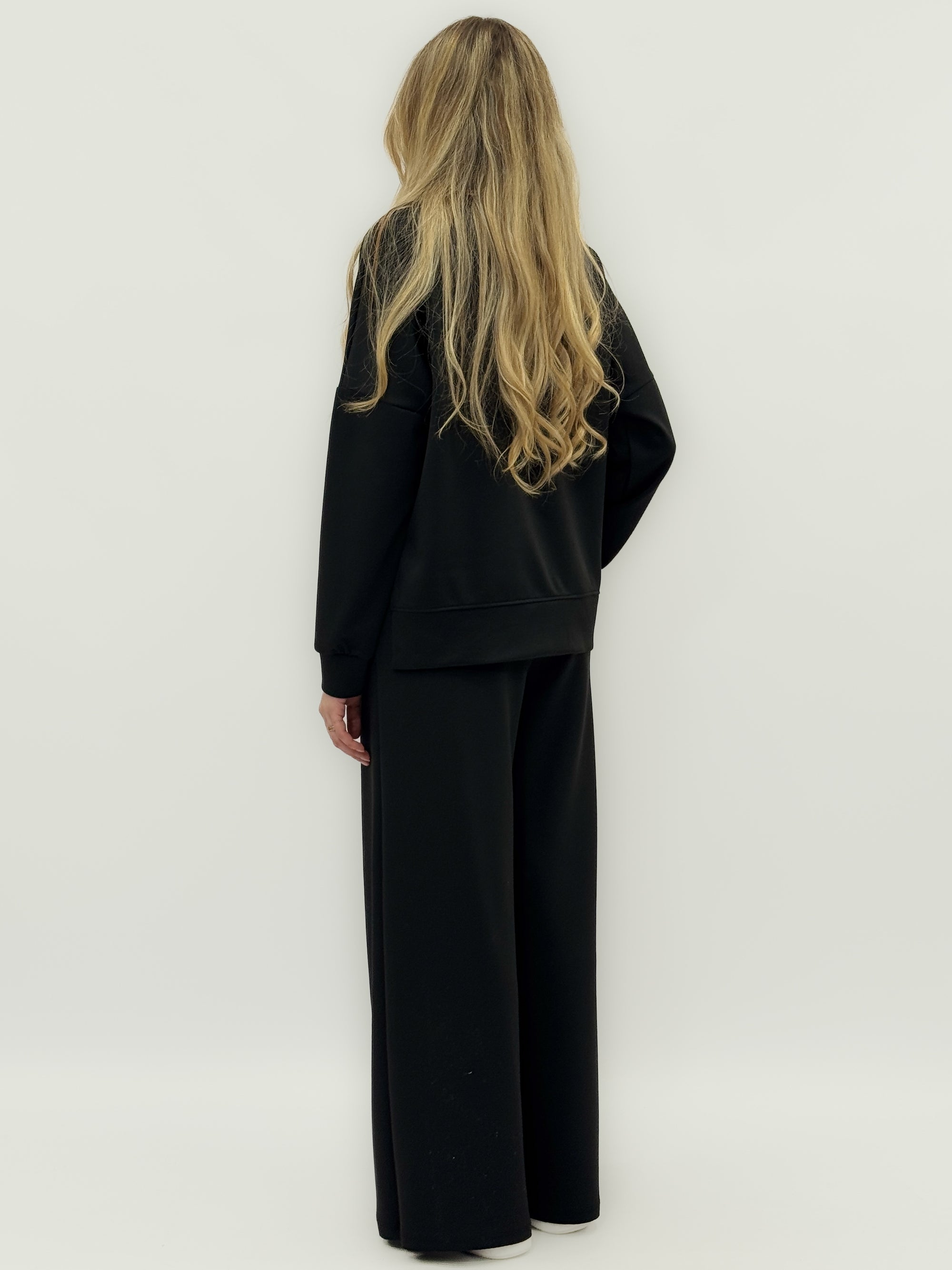 Completo felpa con pantaloni lunghi a palazzo