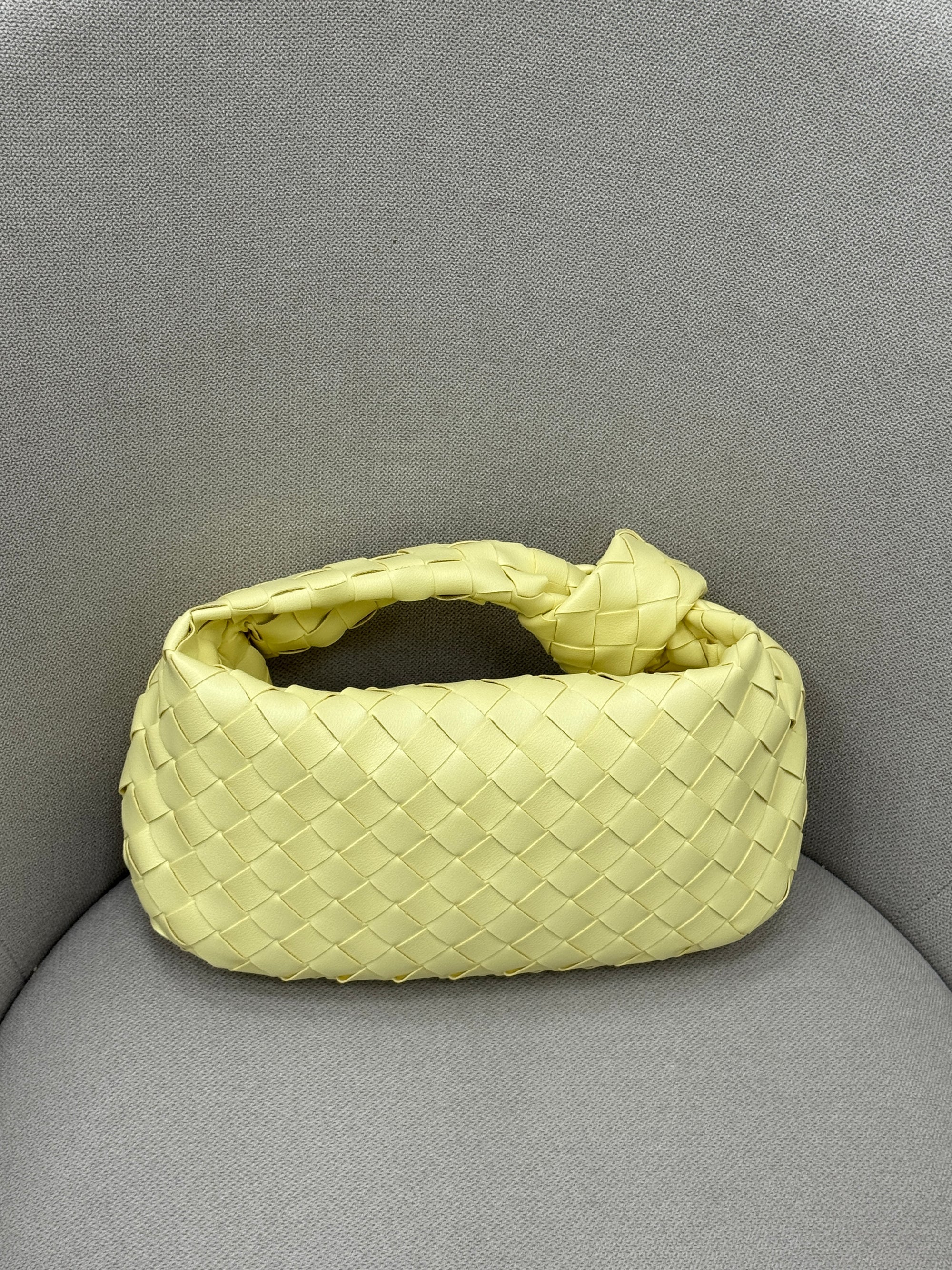 Borsa vera pelle intrecciata con manico