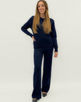 Completo maglia treccia e pantalone – Stile e comfort invernale