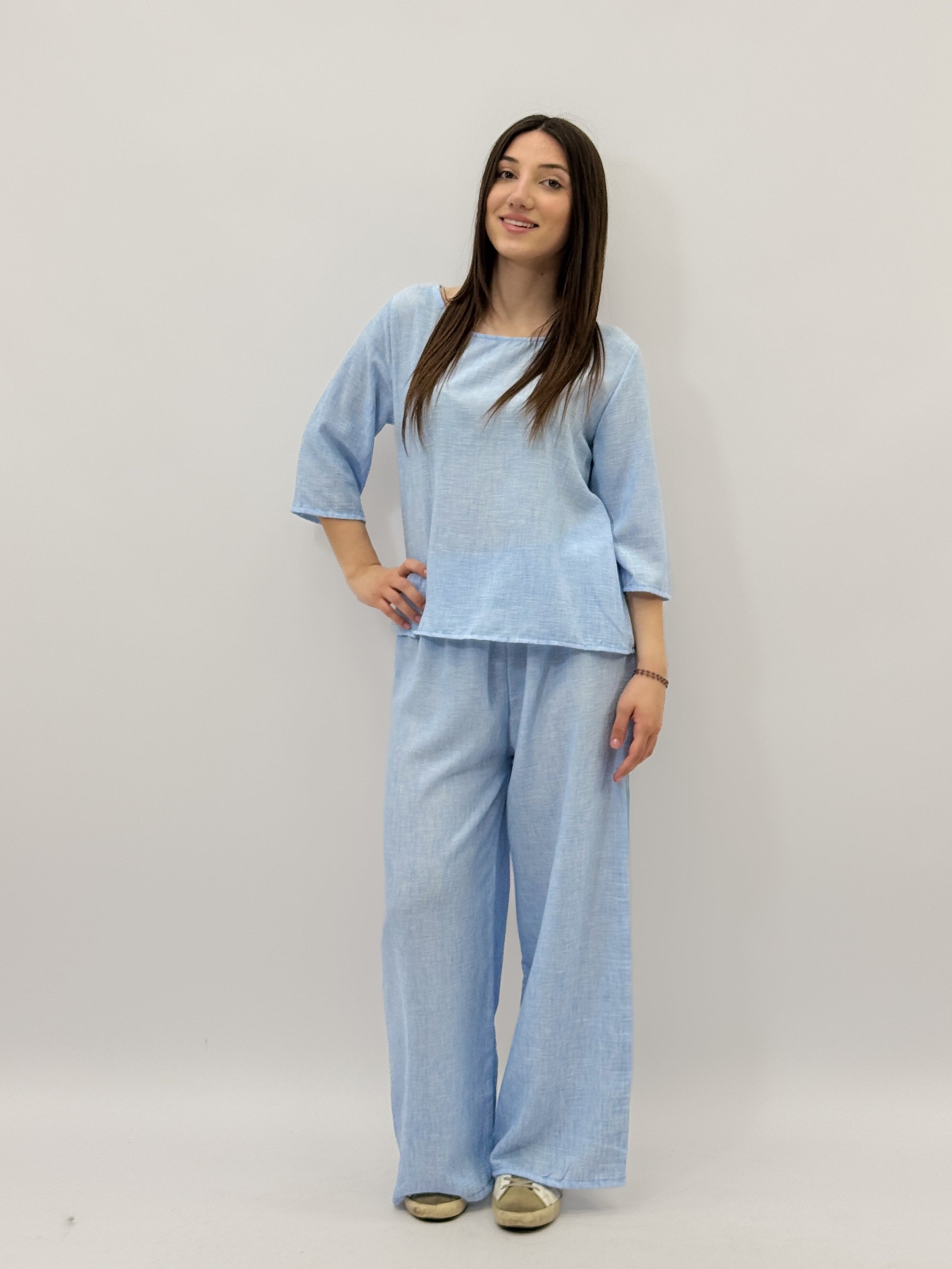 Completo maglia e pantaloni taglia comoda