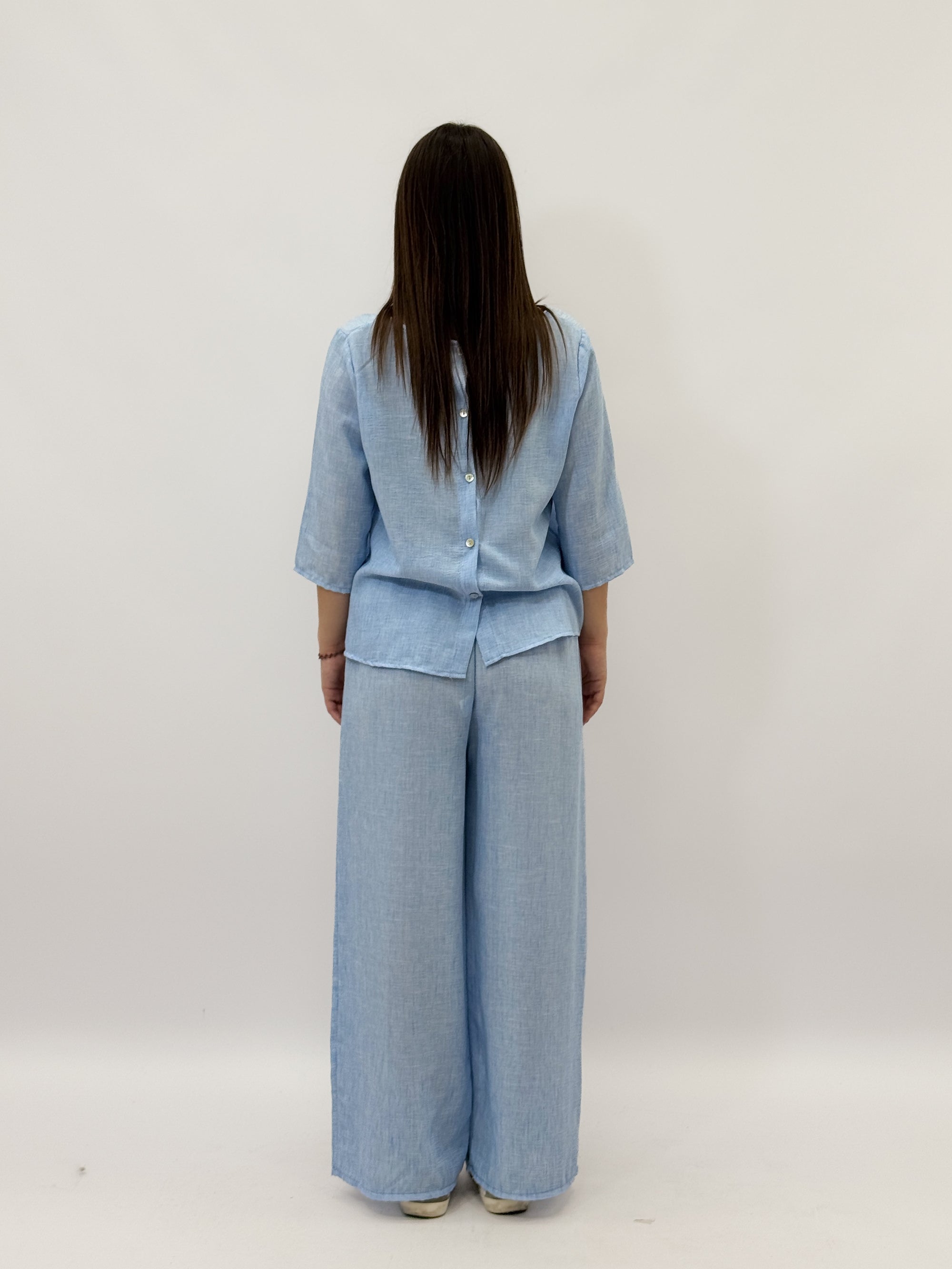 Completo maglia e pantaloni taglia comoda