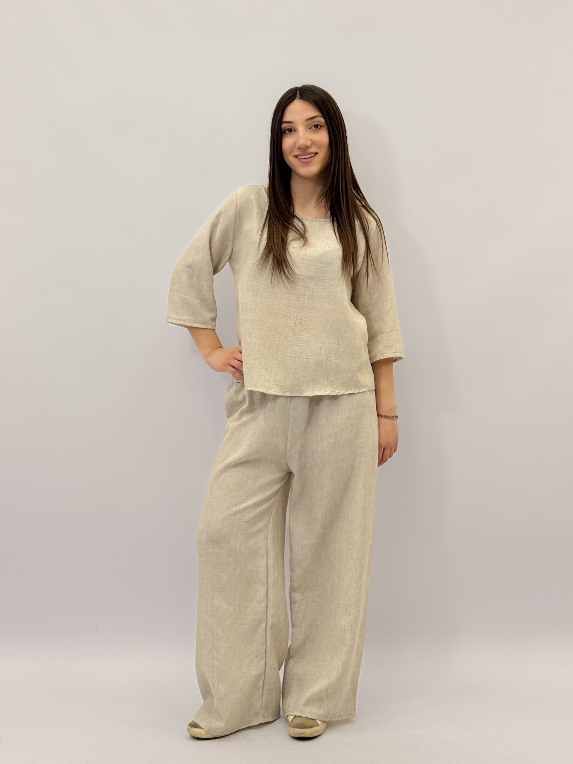 Completo maglia e pantaloni taglia comoda