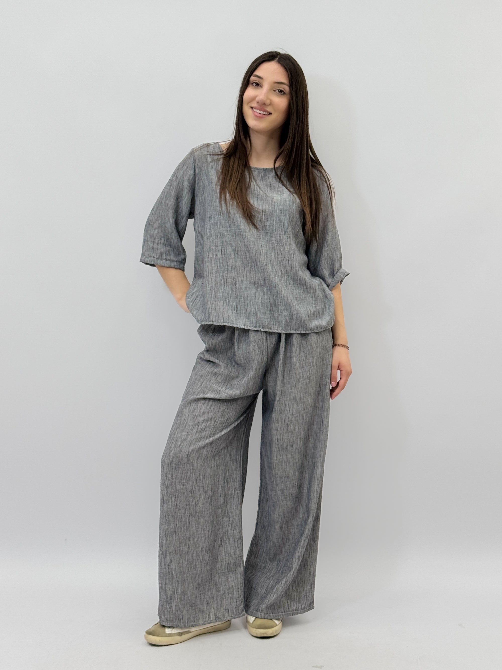 Completo maglia e pantaloni taglia comoda