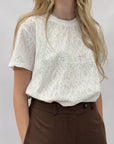 T-shirt sangallo con ricami floreali