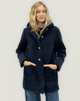 Cappotto caldo effetto teddy con cappuccio