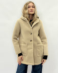 Cappotto caldo effetto teddy con cappuccio