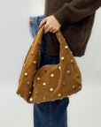 Borsa “Nora” in vera pelle scamosciata con borchie – Made in Italy