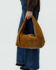 Borsa “Nora” in vera pelle scamosciata con borchie – Made in Italy