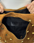 Borsa “Nora” in vera pelle scamosciata con borchie – Made in Italy