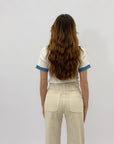 Maglia con bottoni oro
