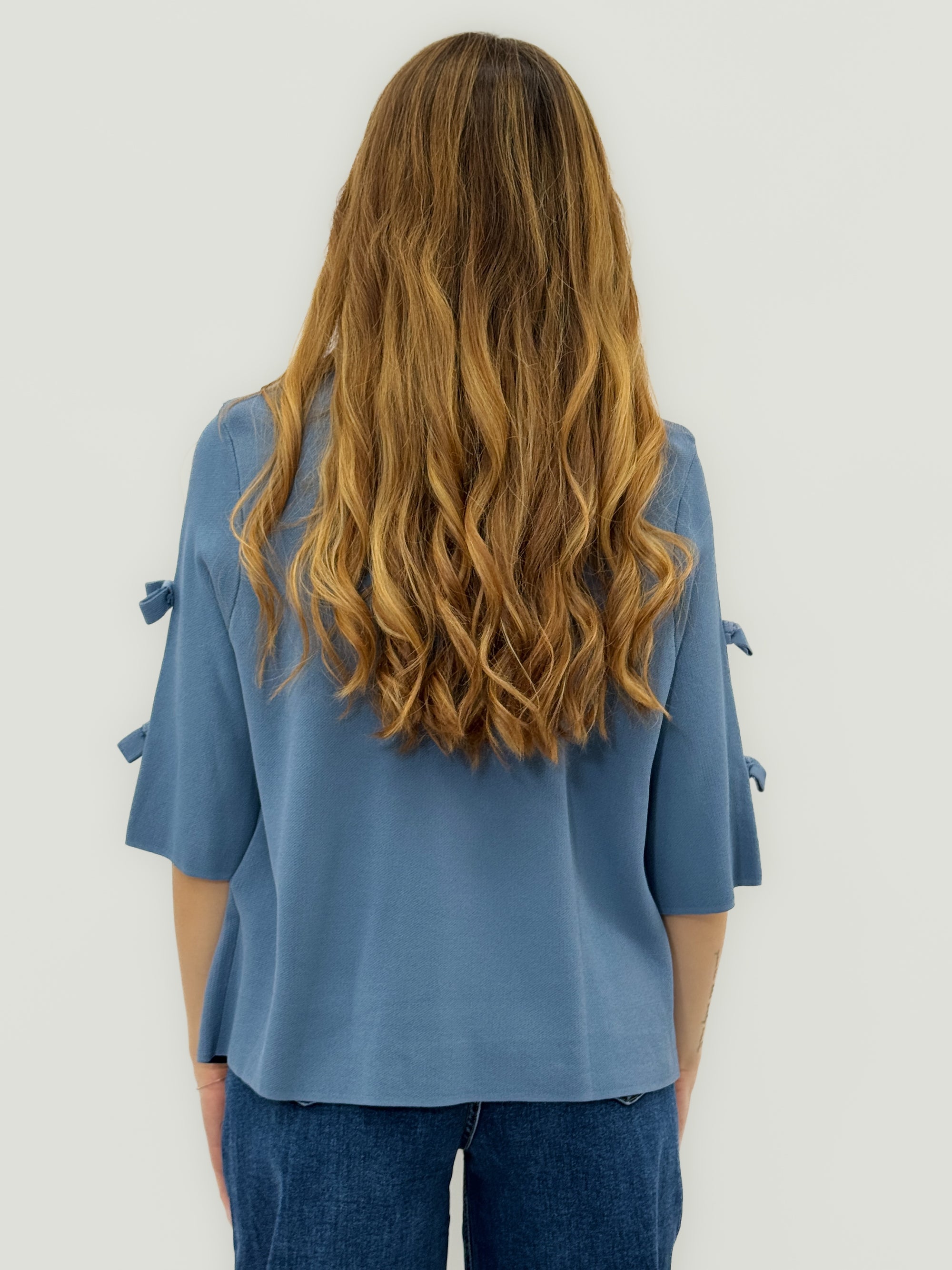 Cardigan leggero con fiocchetti