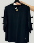 Cardigan leggero con fiocchetti
