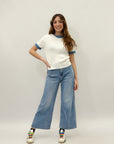 Pantaloni jeans con bottoni