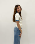 Pantaloni jeans con bottoni