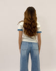 Pantaloni jeans con bottoni