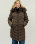 Piumino lungo con pelliccia – Calore e raffinatezza invernale