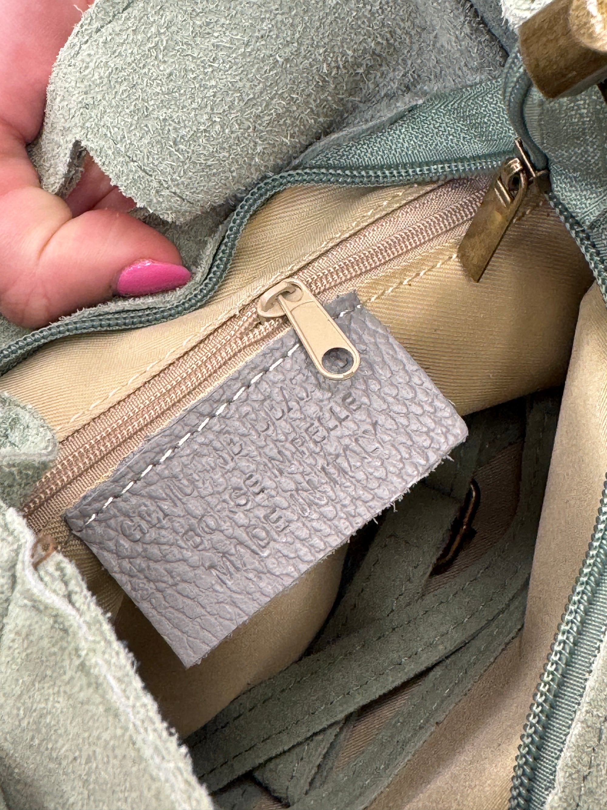 Borsa vera pelle scamosciata con frange