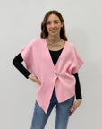 Maglia asimmetrica con bottone