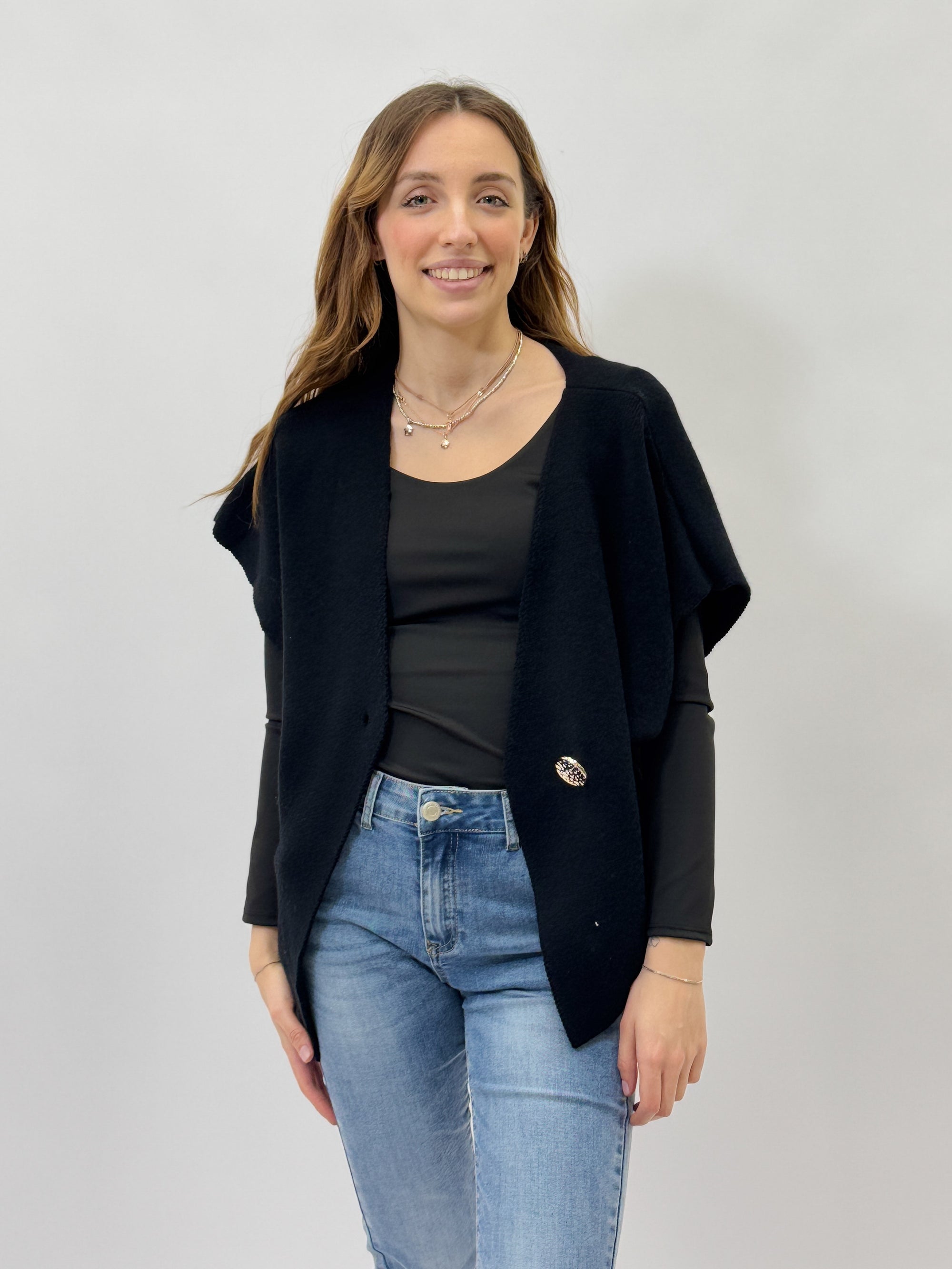 Maglia asimmetrica con bottone